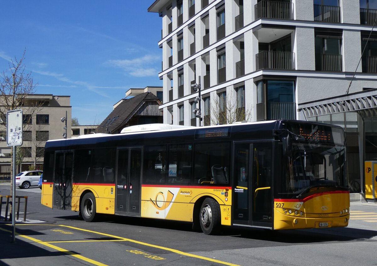 (261'045) - PostAuto Zentralschweiz - Nr. 507/NW 5258/PID 10'254 - Solaris (ex Nr. 57; ex Nr. 18; ex Thepra, Stans Nr. 18) am 6. April 2024 beim Bahnhof Stans