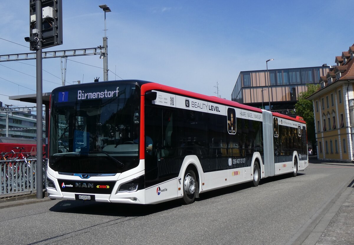 (261'192) - Twerenbold, Baden - Nr. 304/AG 459'044 - MAN am 12. April 2024 beim Bahnhof Baden