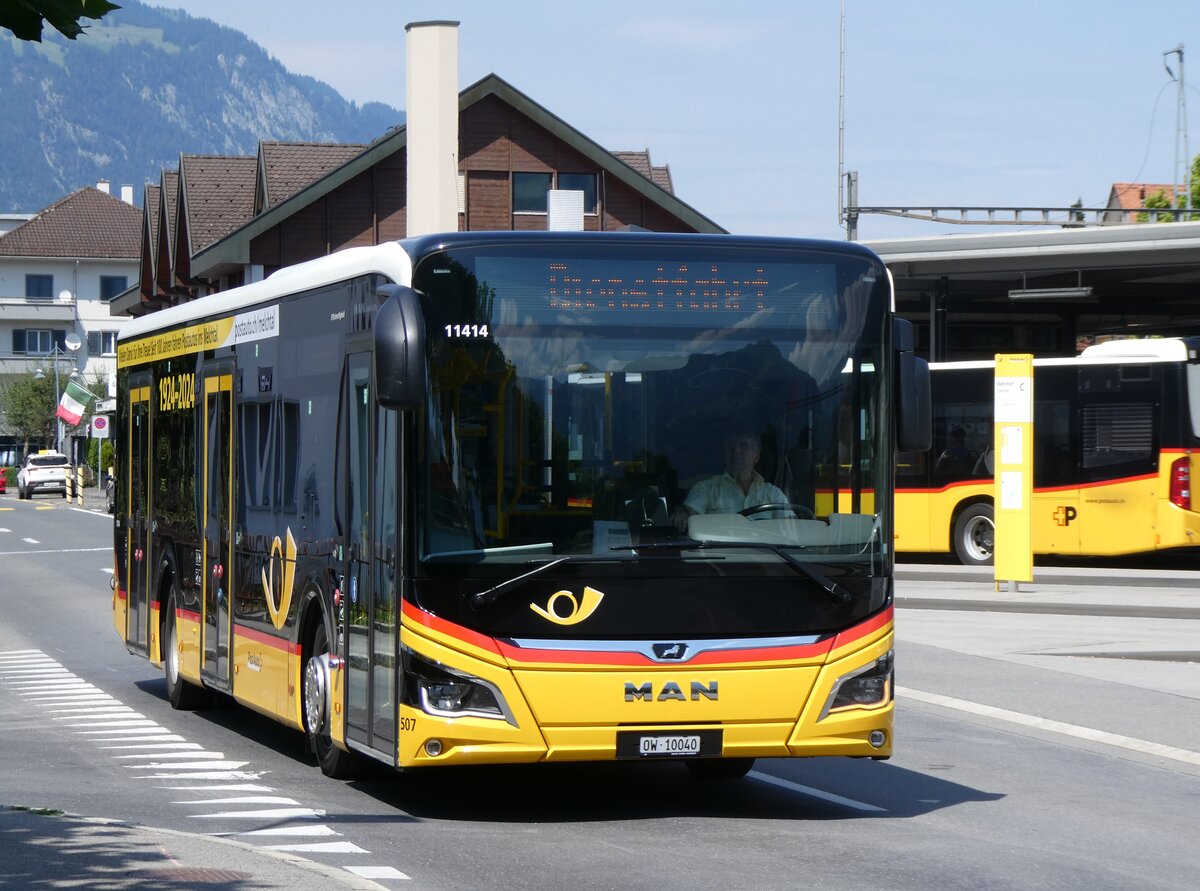 (265'051) - PostAuto Zentralschweiz - Nr. 507/OW 10'040/PID 11'414 - MAN (ex Nr. 7) am 27. Juli 2024 beim Bahnhof Sarnen