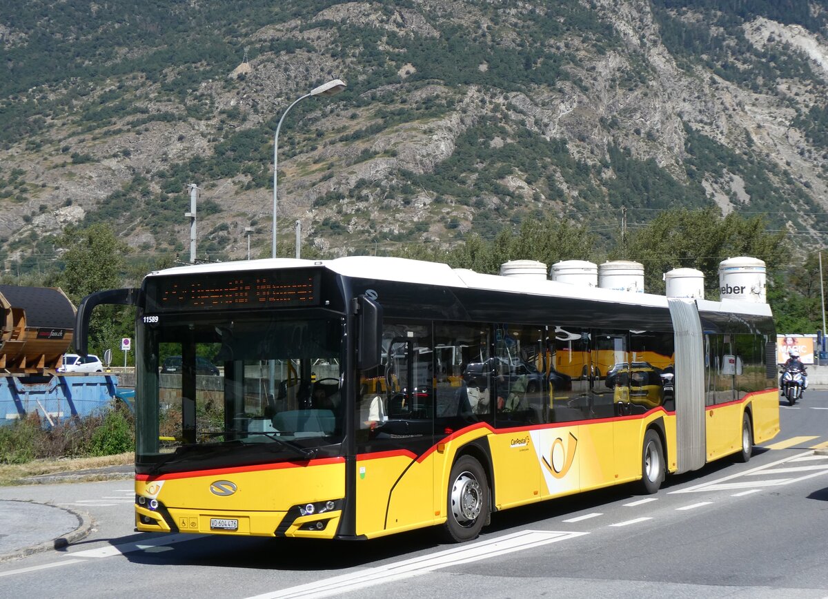 (265'706) - CarPostal Ouest - VD 604'476/PID 11'589 - Solaris am 16. August 2024 beim Bahnhof Gampel-Steg