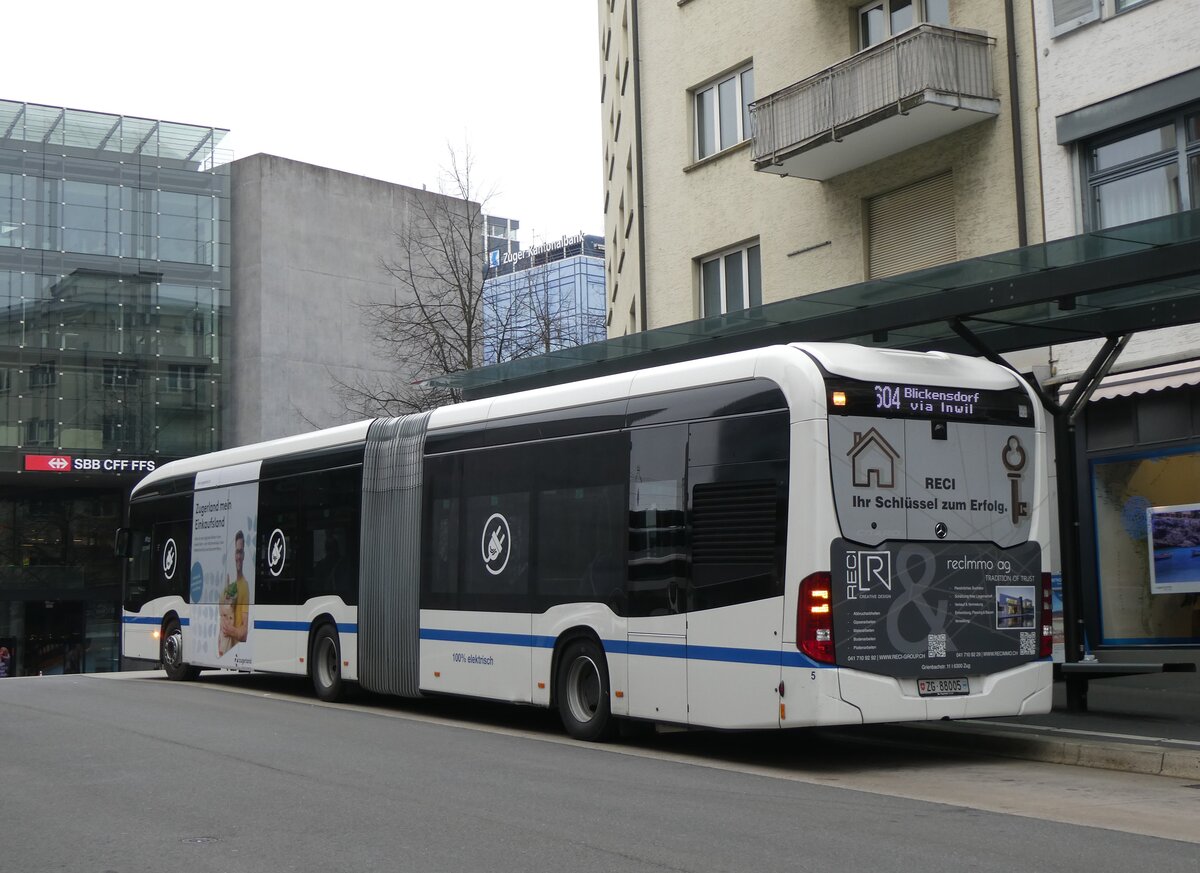 (269'066) - ZVB Zug - Nr. 5/ZG 88'005 - eMercedes am 9. November 2024 beim Bahnhof Zug