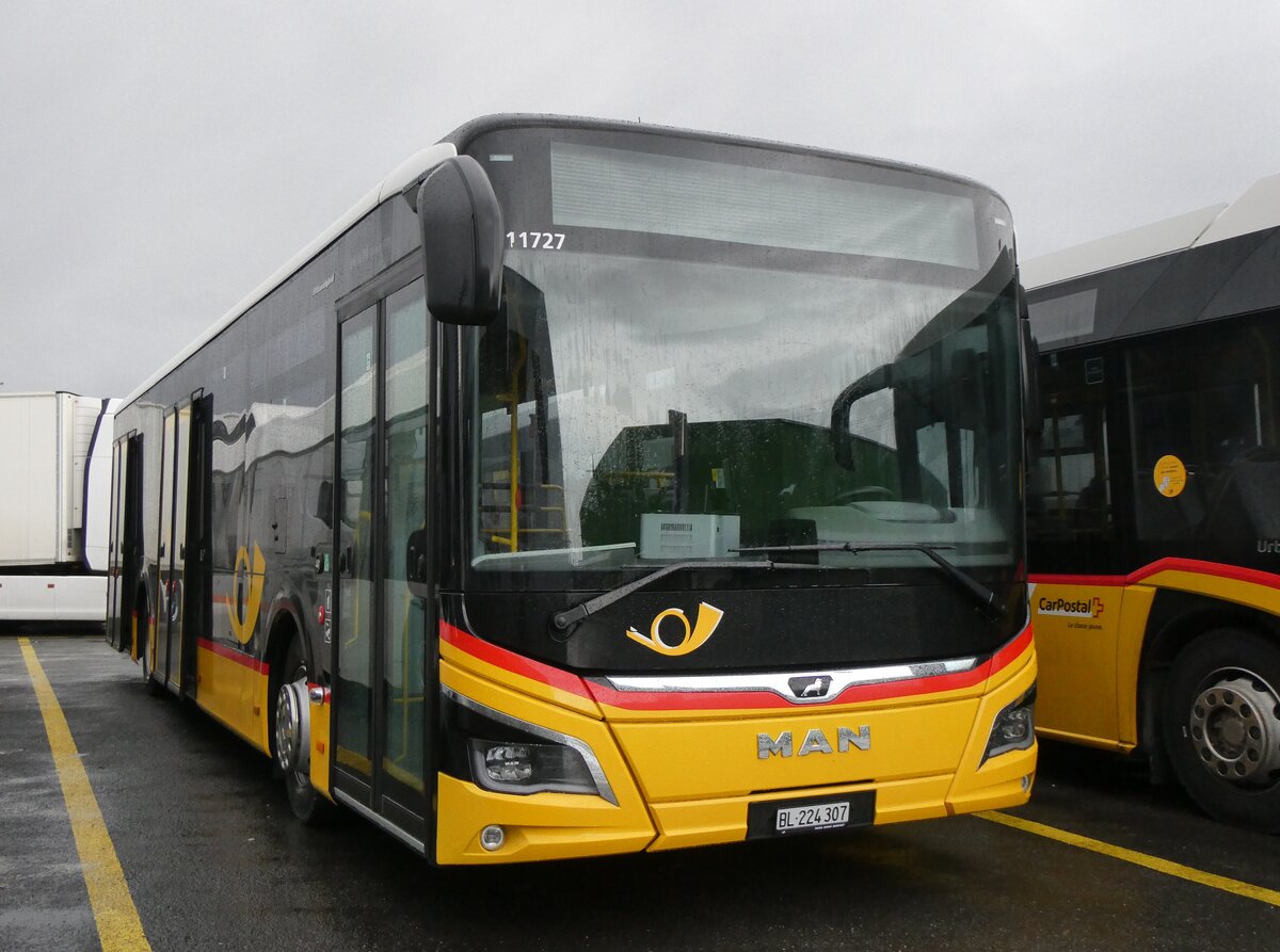 (270'095) - PostAuto Nordschweiz - BL 224'307/PID 11'727 - MAN am 22. Dezember 2024 in Kerzers, Interbus