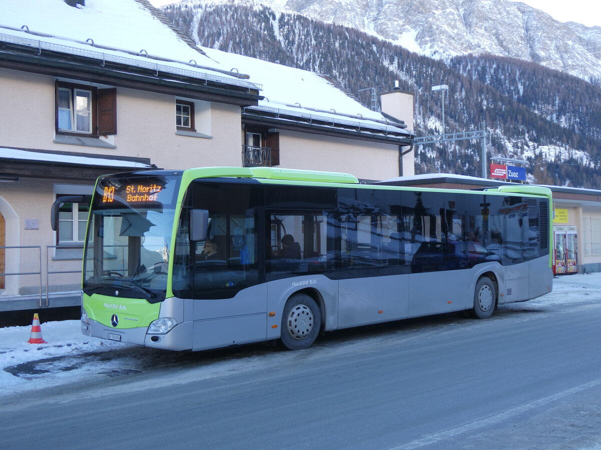 (270'244) - Engadin Bus, St. Moritz - GR 100'694 - Mercedes (ex Busland, Burgdorf Nr. 113) am 27. Dezember 2024 beim Bahnhof Zuoz