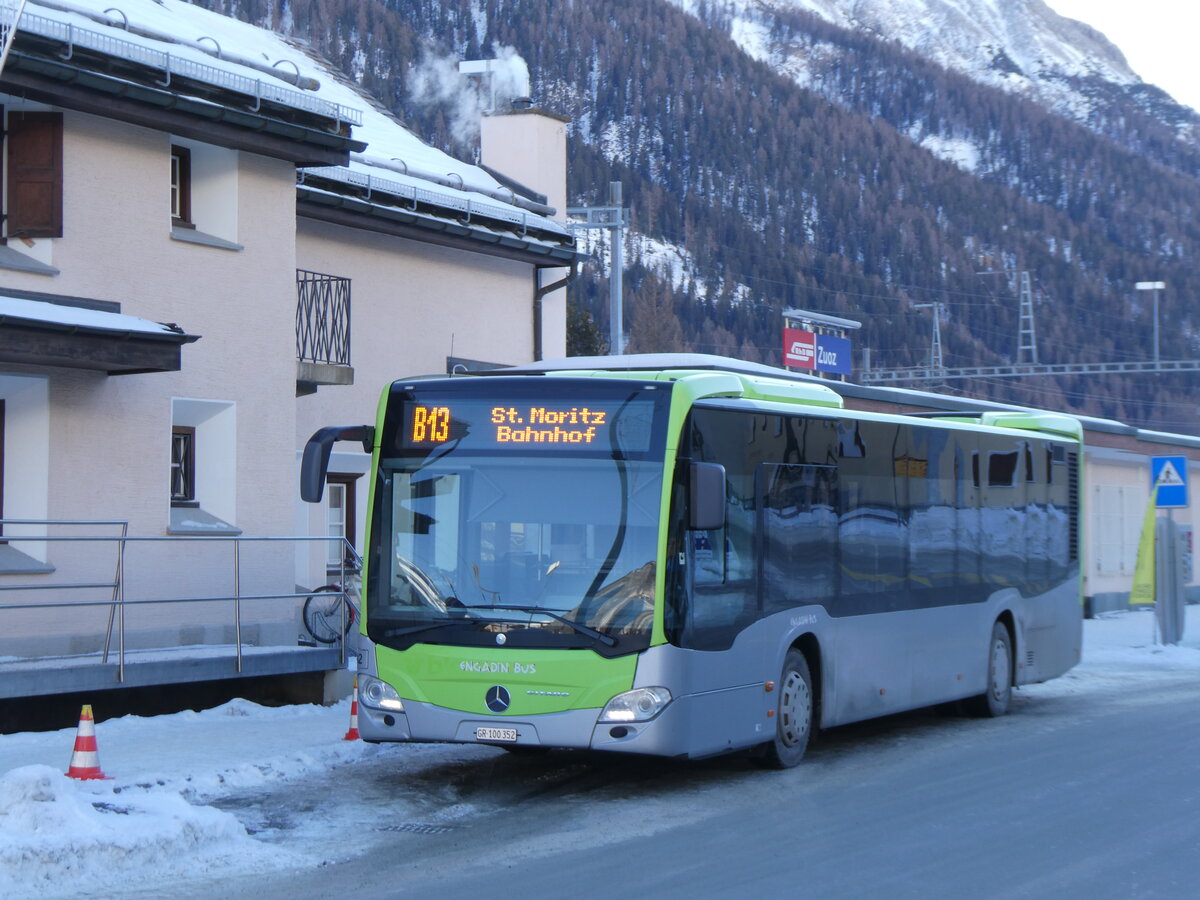 (270'269) - Engadin Bus, St. Moritz - GR 100'352 - Mercedes (ex Busland, Burgdorf Nr. 112) am 27. Dezember 2024 beim Bahnhof Zuoz