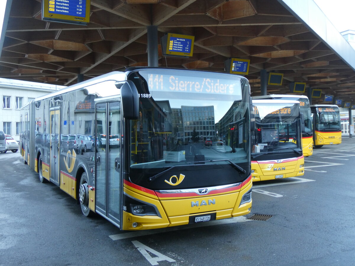 (270'481) - PostAuto Wallis - Nr. 86/VS 548'726/PID 11'889 - MAN am 1. Januar 2025 beim Bahnhof Sion