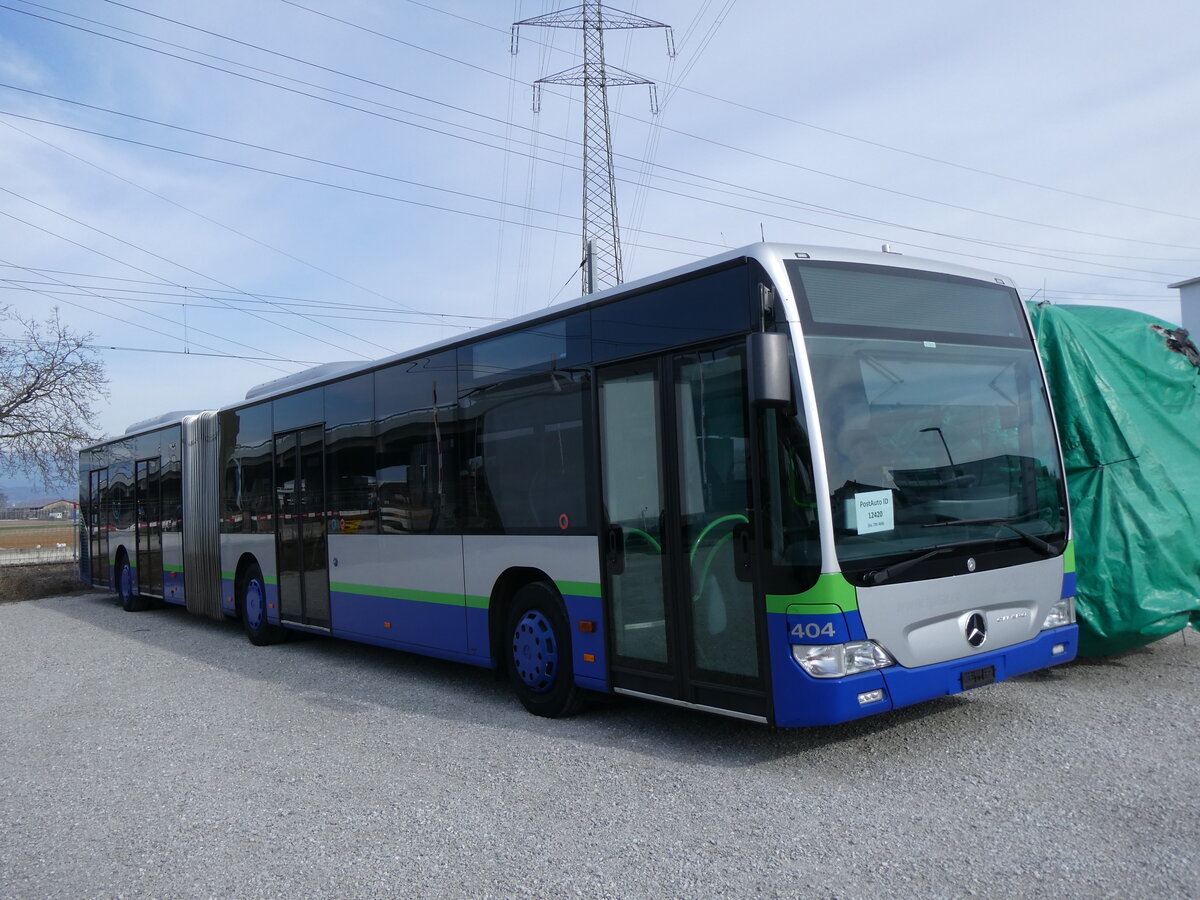 (272'736) - PostAuto Nordschweiz - PID 12'420 - Mercedes (ex TPL Lugano Nr. 404) am 9. Mrz 2025 in Kerzers, Murtenstrasse