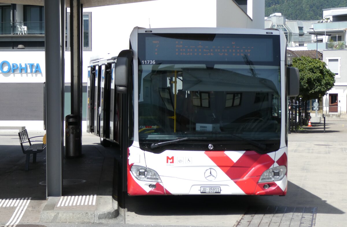 (278'831) - CarPostal Ouest - JU 35'911/PID 11'736 - Mercedes am 14. August 2025 beim Bahnhof Delmont