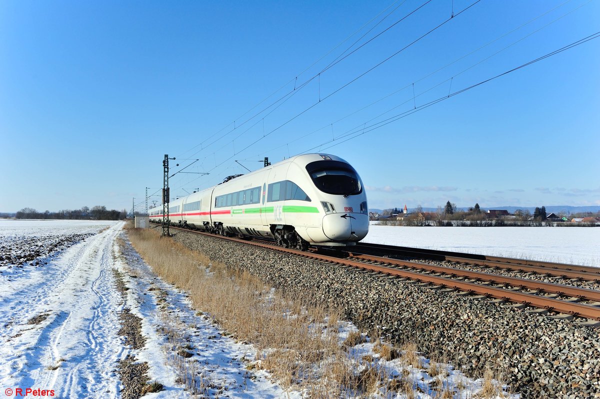 411 062-5  Valingen an der Enz  als ICE 27 Dortmund - Wien kurz vor Moosham. 13.02.21