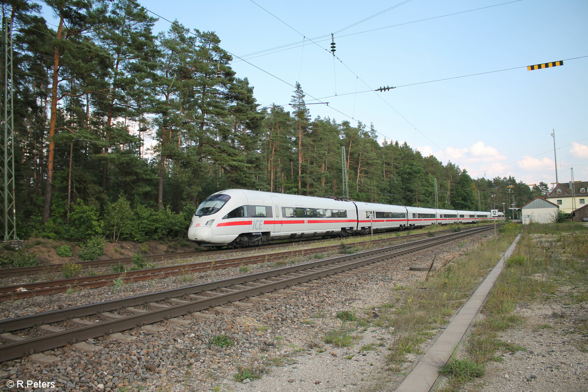 411 063  Ostseebad Binz  als ICE22 Wien - Würzburg bei Ochenbruck. 10.09.23