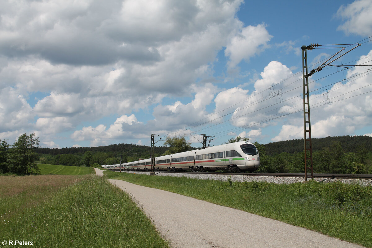 411 080-5  Darmstadt  als ICE 91 Hamburg - Wien  Donauwalzer  bei Pölling. 20.05.24