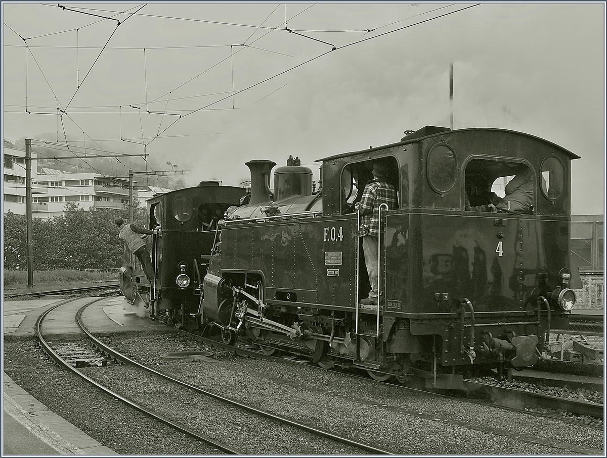 50 Jahre Blonay - Chamby; Mega Steam Festival: die Beidne HG 3/4 3 und 4 rangieren in Vevey um später ihren Riviera Belle Epoque Zug nach Chamby zu ziehen.
Bei Loks wurden 1913 gebaut, die HG 3/4BFD gehört der Blonay-Chamby Bahn und die FO N° 4 ist als Gastlok der Dampfbahn Furka Bergstreck zu Besuch.
13. Mai 2018