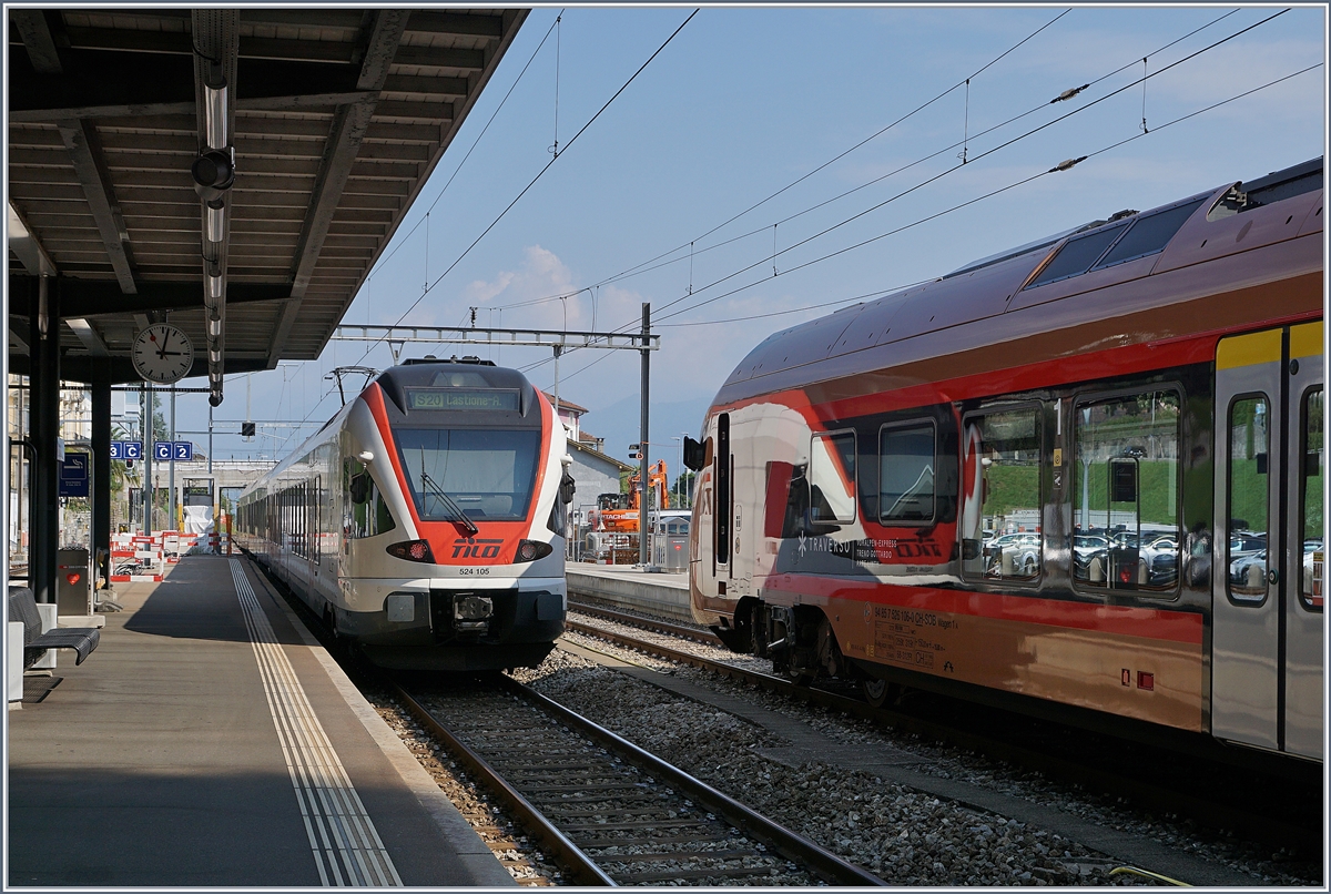 Bald (lang ersehnter) Alltag: während der TILO RABe 524 105 als S 2 nach Castine Arbedo Locarno verlässt, steht SOB RABe 526 206-8 (UIC 94 85 7 526 206-8 CH-SOB), hier auf einer Testfahrt, in Locarno für die direkte Fahrt nach Zürich oder Basel bereit.

15. Sept. 2020
