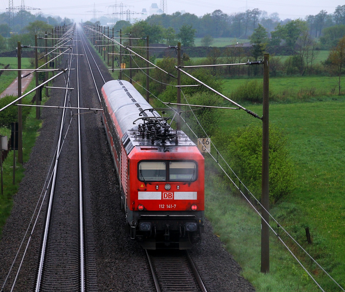 DB Regio 112 141-7 als Schublok der Rb 21054 nach Flensburg aufgenommen bei Lürschau. 07.05.2014