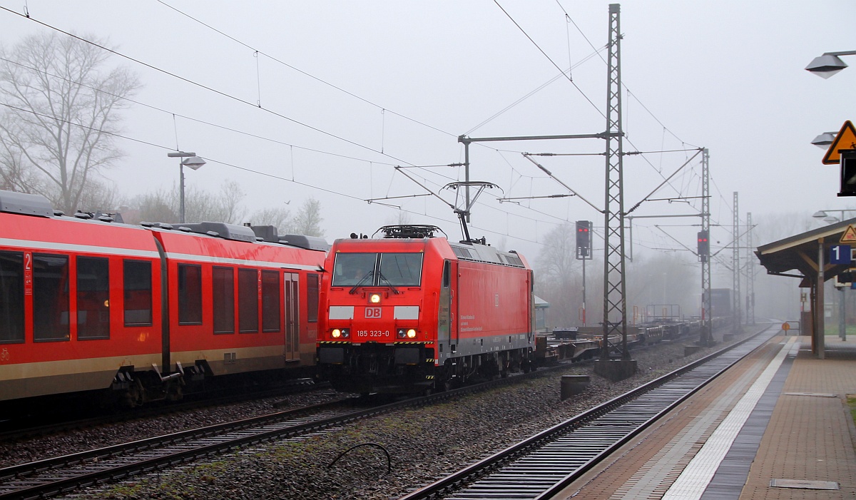 DBS/RSC 0185 323-0 mit dem KT 40003 und gut 180min plus rumpelt hier durch Schleswig. 06.04.2014