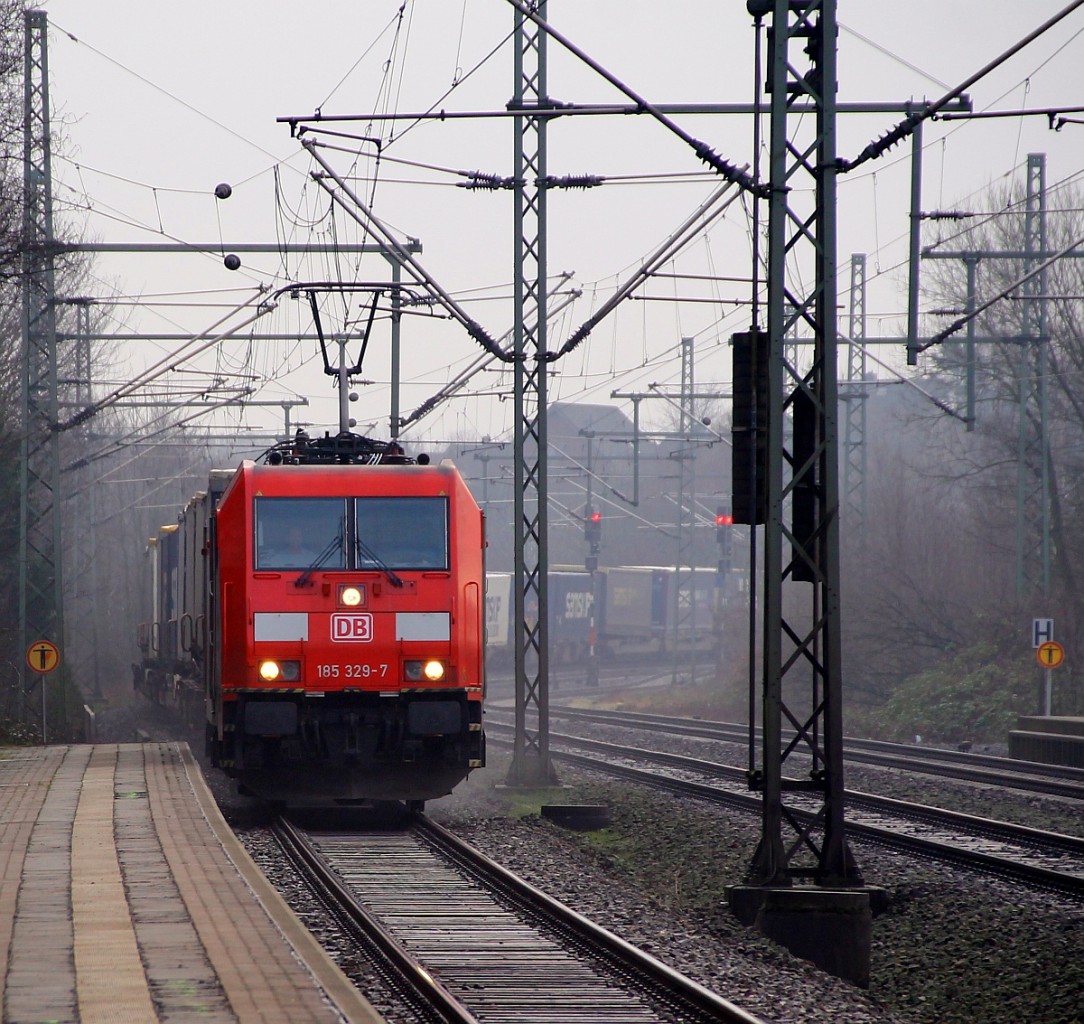 DBS/RSC 0185 329-7 nach ihrem LKW Unfall wieder Repariert durchfährt hier Schleswig mit dem 44732 Richtung Padborg. 18.01.2014