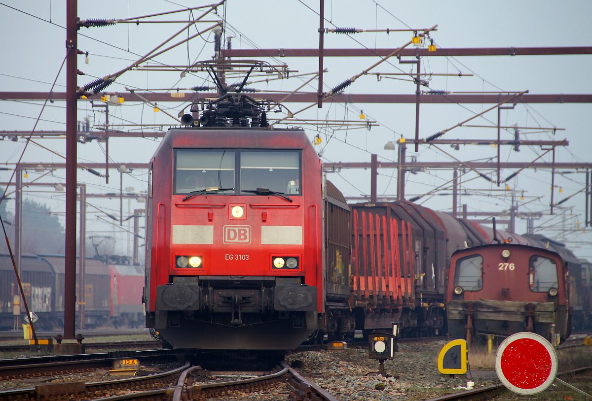 DBS/RSC EG 3103 hat mit einem Güterzug Einfahrt in Padborg/DK. 04.03.2014