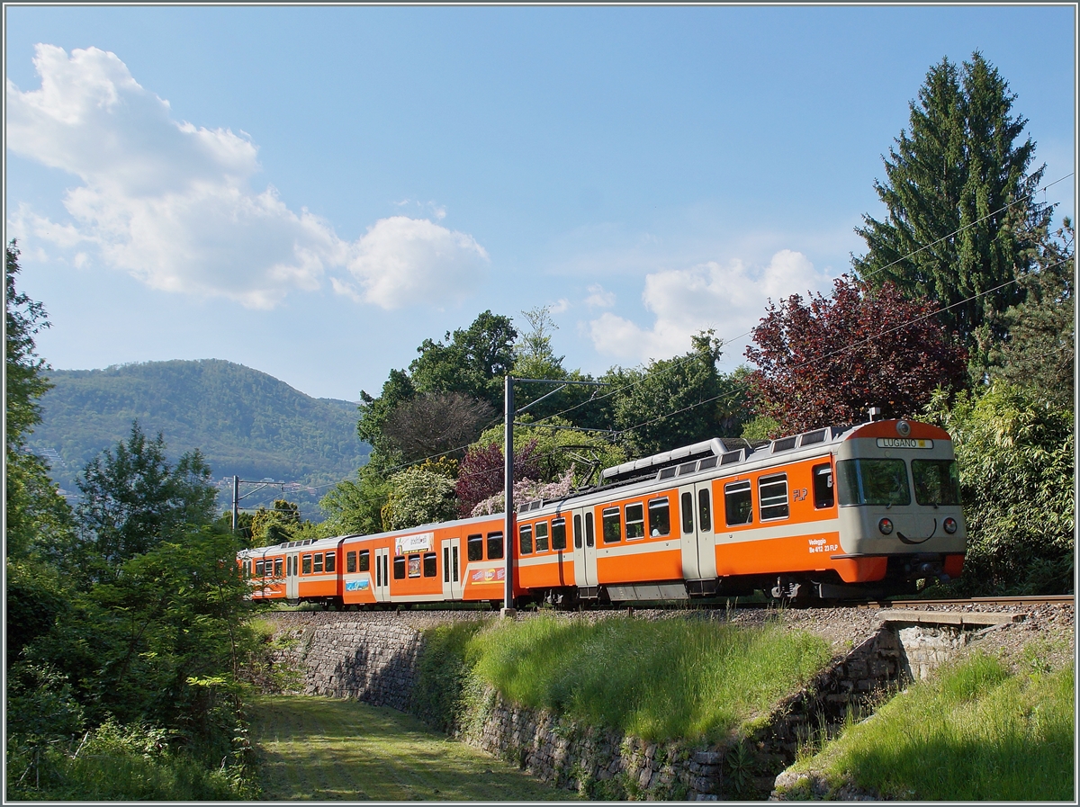 Der FLP Be 4/12 N° 22  Malcantone  als S 60 187 auf der Fahrt von Lugano nach Ponte Tresa kurz nach der Kreuzungsstation Cappella Agnuzzo.
5. Mai 2014