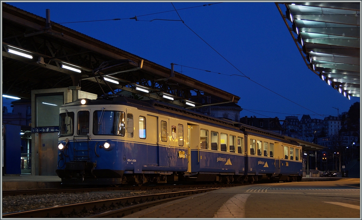 Der MOB ABDe 8/8 4004  Fribourg  wartet in Montreux auf die Abfahrt. 
9. März 2014