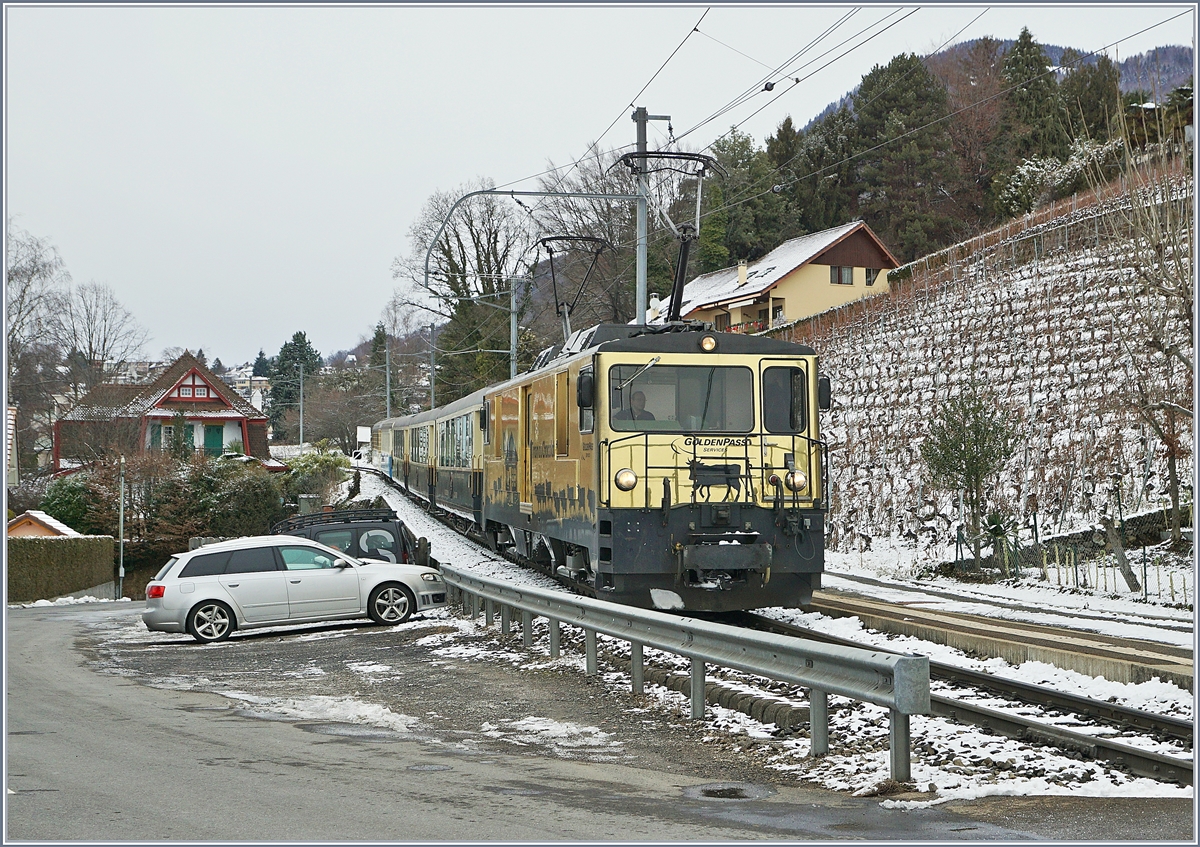 Die MOB GDe 4/4 6003 ist mit ihrem GoldenPass Classic auf der Fahrt von Zweisimmen nach Montreux und hat in Plachamp ihr Ziel schon fast erreicht. 

29. Dez. 2017