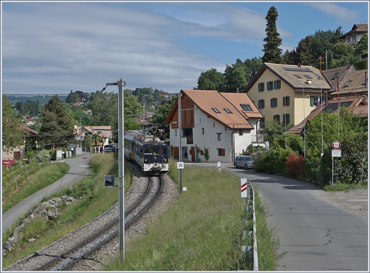 Die MOB GDe 4/4 6005 ist mit ihrem Panoramic Express bei Planchamp auf dem Weg nach Montreux. 

10. Mai 2020