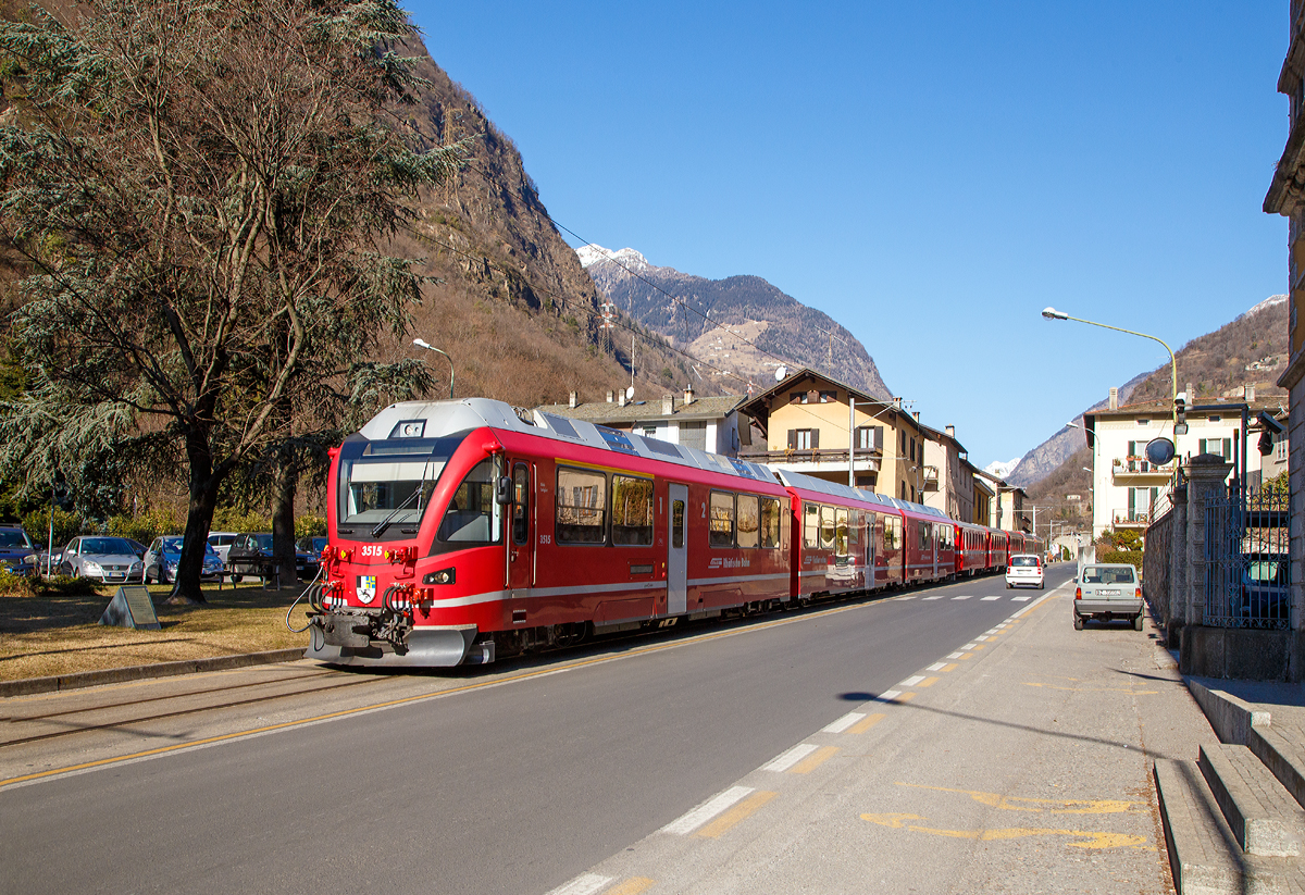 Ein RhB Regional-Zug erreicht am 19.02.2017 Tirano, der Zug besteht aus dem 3-teiligen ALLEGRA-Zweispannungstriebzug (RhB ABe 8/12) 3515  Alois Carigiet  mit 5 angehangenen Personenwagen.

Auf der Berninabahn sind die Triebzüge das Haupttraktionsmittel und ziehen Regionalzüge, den Bernina-Express sowie Güterzüge.  

Dieser Zweispannungstriebzug ist nicht nur hochmodern, sondern verbirgt in seinem Innern wesentliche Innovationen und viel Power. Die mehrsystemfähige Antriebsausrüstung bringt eine Leistung von 2,6 MW, zudem haben die Triebzüge eine hohe Anfahrzugkraft von 260 kN. Hier auf der Berninabahn (St. Moritz–Tirano) mit einer Maximalsteigung 70 ‰ wird mit 1.000 V Gleichstrom gefahren, auf der Arosabahn und der Bahnstrecke Landquart–Davos Platz im 11 kV 16.7 Hz Wechselstrombetrieb.

TECHNISCHE DATEN der RhB ABe 8/12: 
Nummerierung:  3501–3515
Anzahl:  15
Hersteller:  Stadler Rail
Baujahre:  2009–2010
Achsformel:  Bo’Bo’+2’2’+Bo’Bo’
Spurweite:  1.000 mm (Meterspur)
Länge über Puffer:  49.500 mm
Höhe:  3.800 mm
Breite:  2.650 mm
Leergewicht:  106 t
Höchstgeschwindigkeit:  100 km/h
Max. Leistung (am Rad):  2.600 kW bei AC / 2.400 kW bei DC
Anfahrzugkraft:  260 kN
Treibraddurchmesser:  810 mm (neu) / 740 mm (abgenutzt)
Laufraddurchmesser:  685 mm  (neu) / 635 mm (abgenutzt)
Achsabstand im Motordrehgestell: 2.000 mm
Achsabstand im Laufdrehgestell: 1.800 mm
Stromsystem:  11 kV 16.7 Hz AC und 1 kV DC
Anzahl der Fahrmotoren:  8
Sitzplätze:  1. Klasse: 24 / 2. Klasse: 76 + 14 Klappsitze
Fußbodenhöhe:  480 mm Niederflur / 1.050 mm Hochflur
Niederfluranteil:  22 % 
Anhängelast auf 70‰: 140 t
Anhängelast auf 35‰: 245 t
