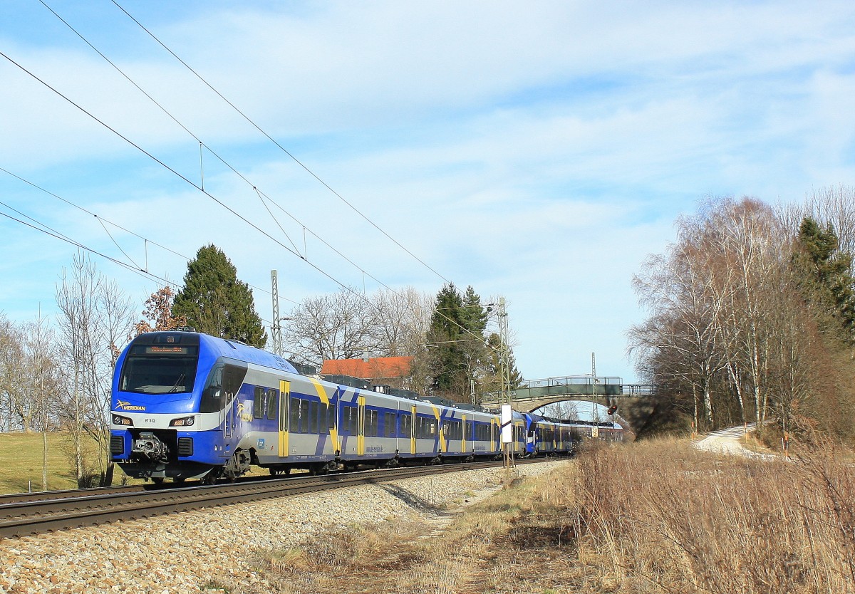 ET 312 ist am 15. Februar 2014 bei bersee auf dem Weg nach Mnchen.