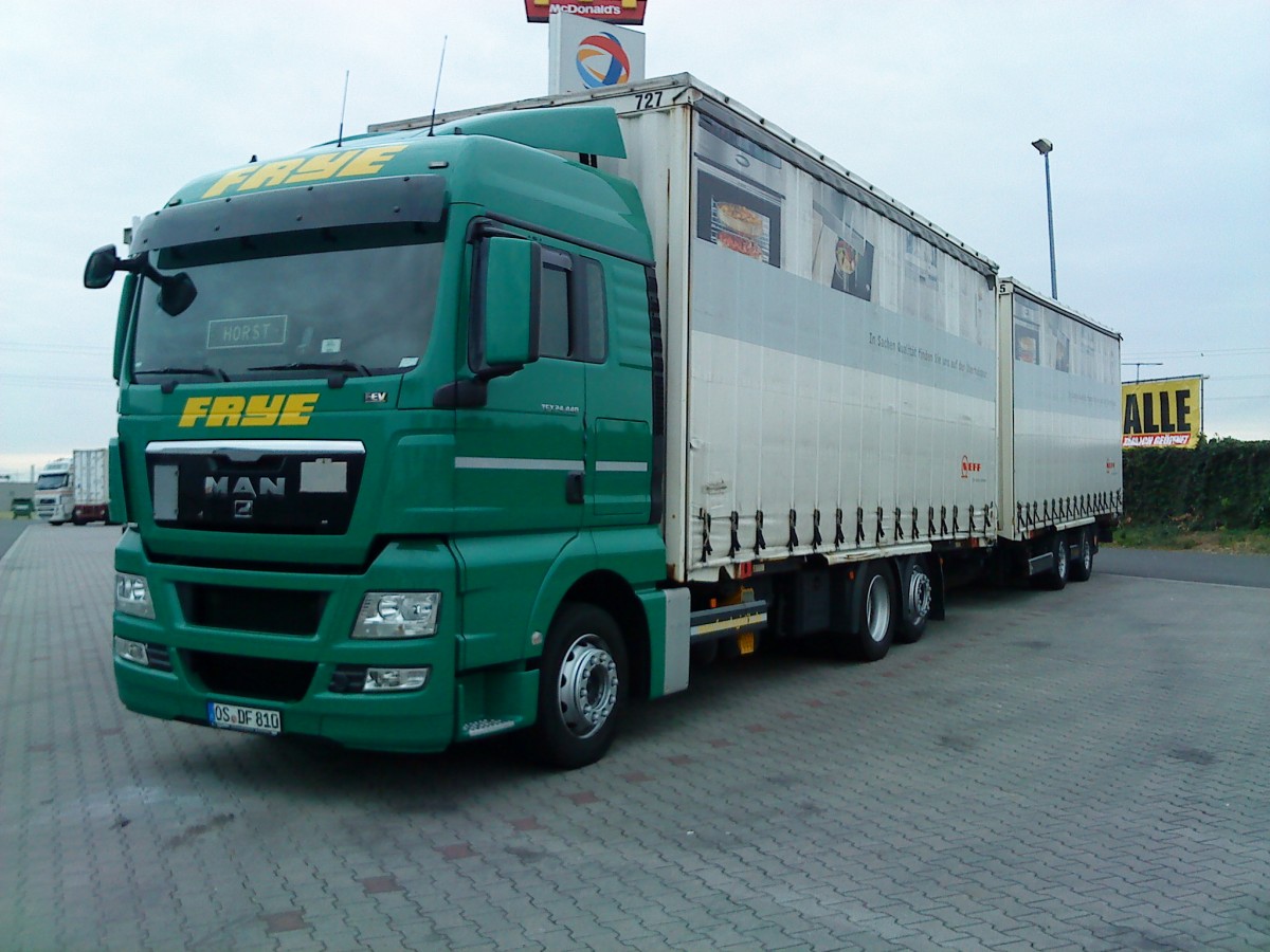 LKW MAN TGX Hngerzug der Spedition Frye gesehen auf dem Autohof in Grnstadt am 15.06.2014