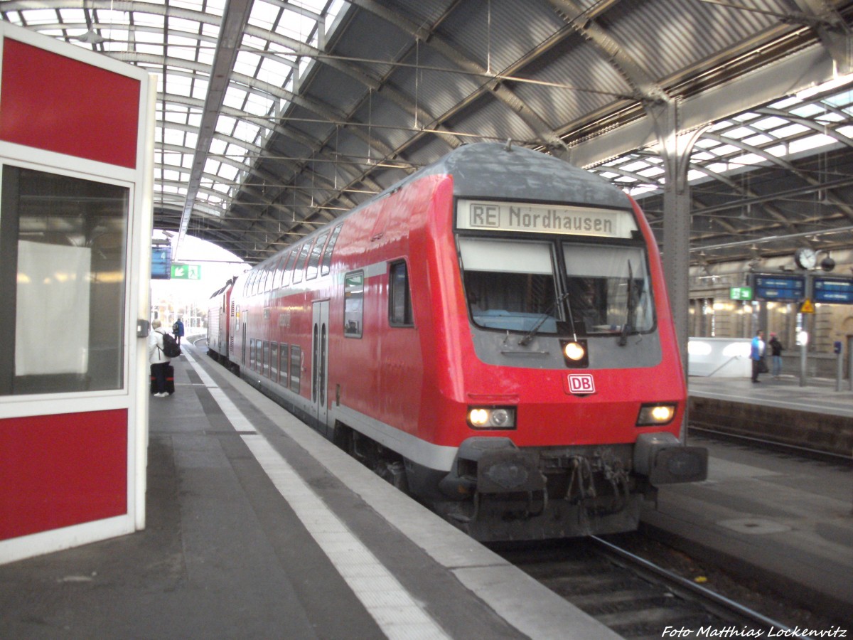 Mit Steuerwagen voraus steht 143 011-5 mit ziel Nordhausen im Bahnhof Halle (Saale) Hbf am 24.11.14