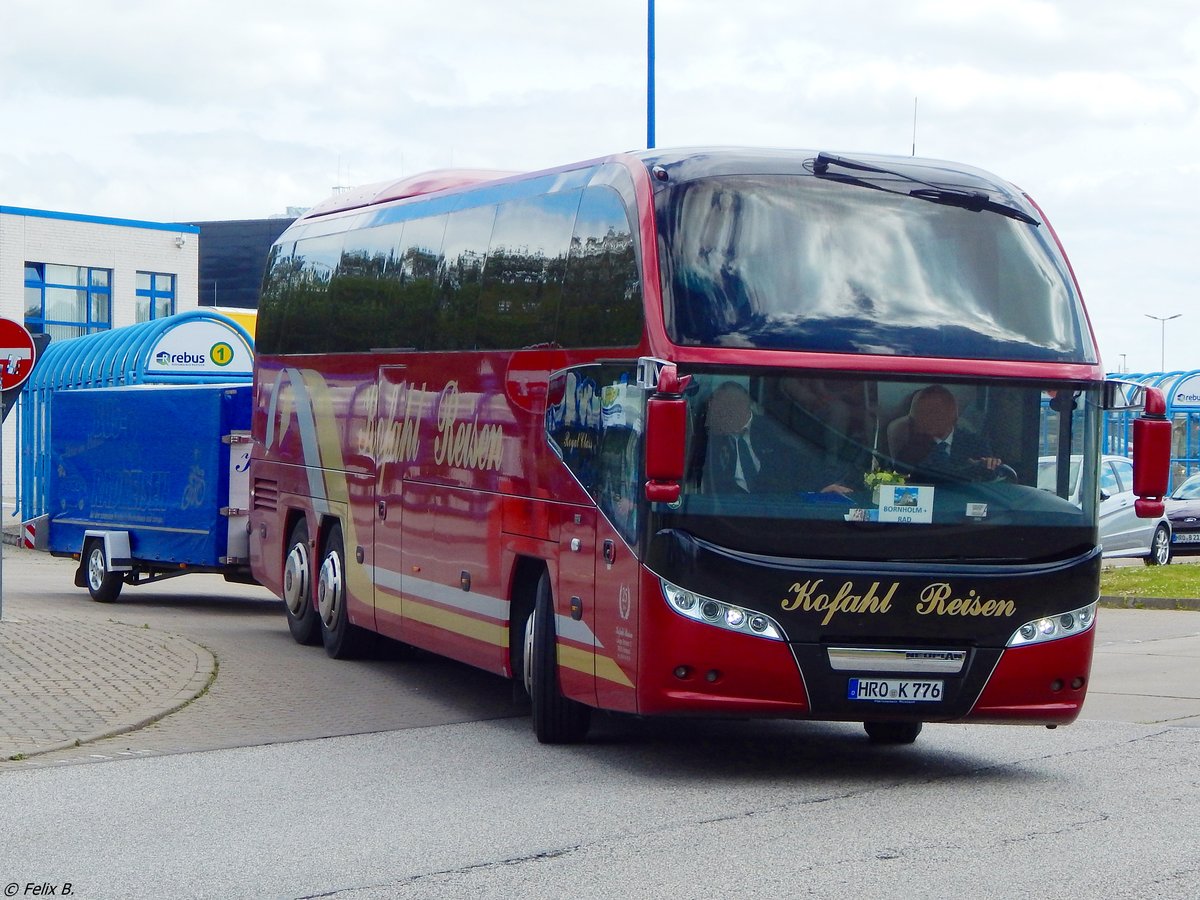 Neoplan Cityliner von Kofahl Reisen mit Anhänger aus Deutschland in Rostock. 