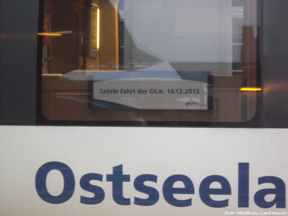 OLA VT 0009 mit dem Schild  Letzte Fahrt der OLA : 14.12.13  im Bahnhof G�strow am 14.12.13