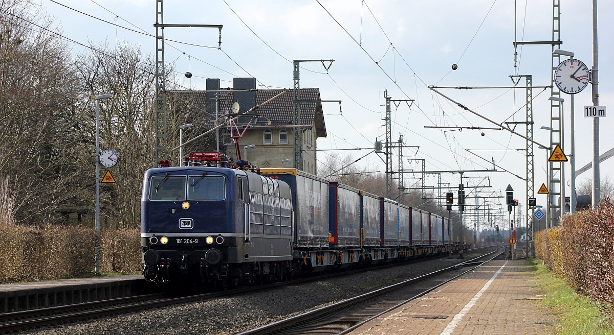 SEL 181 204-9, REV/BPSM/29.06.20 mit dem CargoTrans KLV nach Neumünster/Duisburg. Jübek 26.03.2021