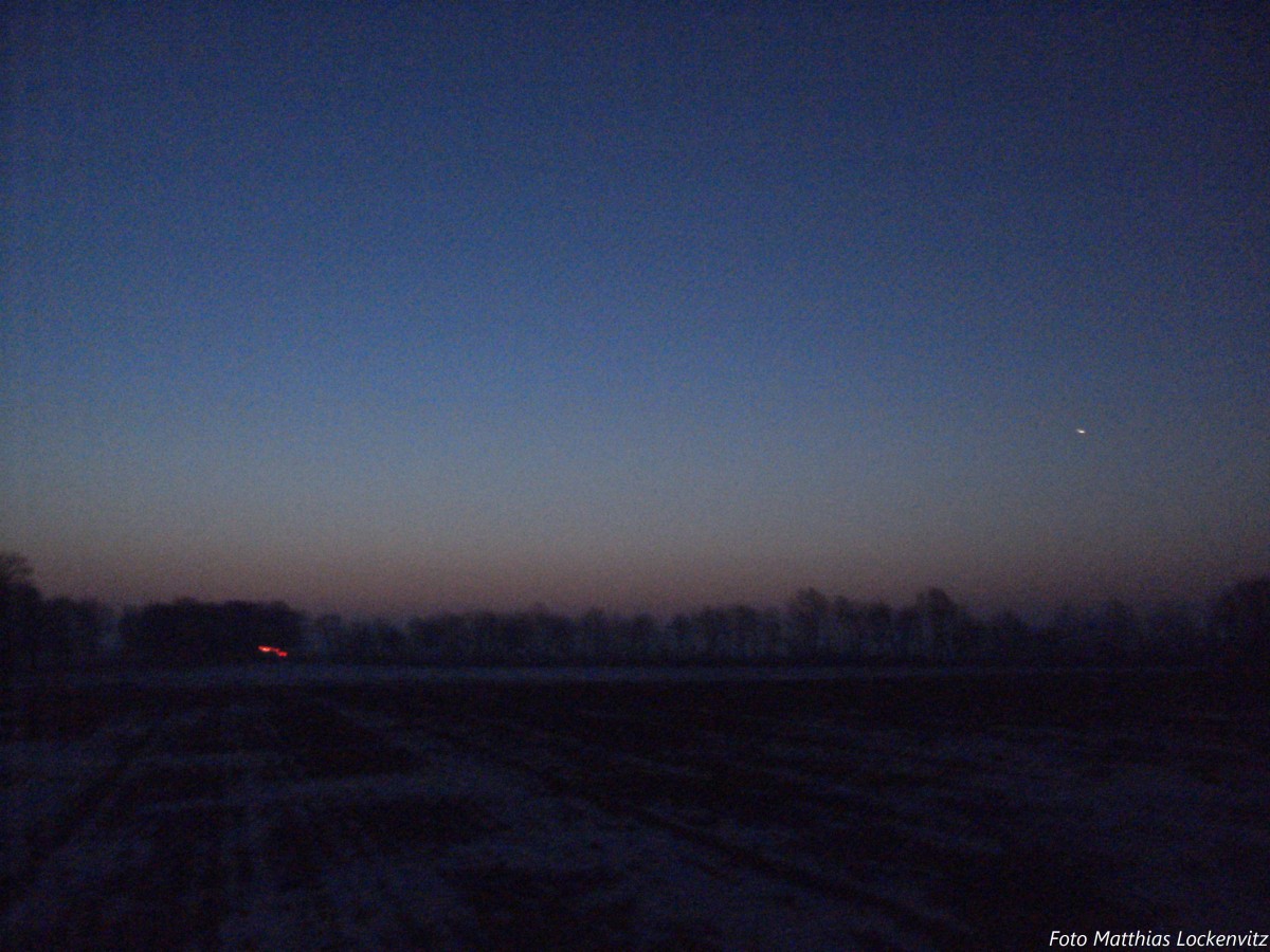 Sonnenaufgang ber der Insel Rgen am 4.2.14