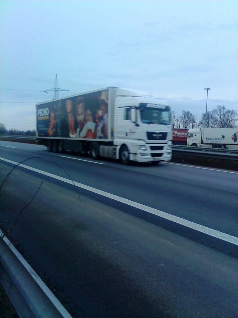 SZM MAN TGX 18.440 mit Khlkofferauflieger gesehen auf der A 61, Hhe Raststtte Dannstadt, am 15.01.2014