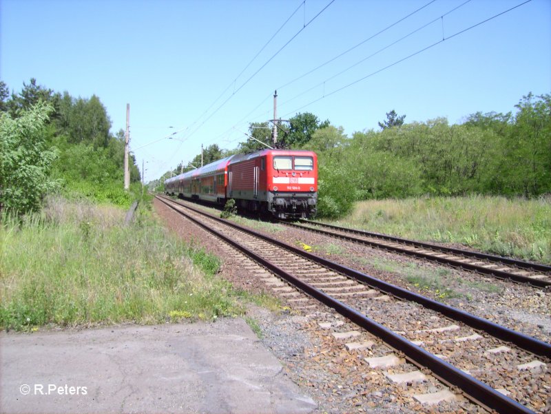 112 124 schiebt ihren RE1 Magdeburg beim ex HP Vogelsang. 14.06.06