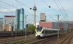 Der Stadler Flirt ET 7.01 der Eurobahn durchfhrt als RE 13 Hamm - Venlo/NL (Maas-Wupper-Express) am 25.05.2014 Dsseldorf-Hamm.