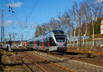 Nun mit DB-Logo.....
Nach der Insolvenz  der Abellio Rail NRW GmbH ist das Ruhr-Sieg-Netz (RE 16 und RB 91), wie auch die Stadler FLIRT dieser Linie, an die DB Regio NRW gegangen.

DB Stadler FLIRT ET 23 2101 (94 80 0427 600-2 D-DB / 94 80 0827 100-9 D-DB / 94 80 0427 100-3 D-DB), ex Abellio Rail NRW ET 23 2101  Altena (Westf.) , ex ET 23 001, fährt am sonnigen 23.02.2022, als RB 91  Ruhr-Sieg-Bahn  (Hagen - Finnentrop - Kreuztal – Siegen), von Kreuztal weiter in Richtung Siegen. 

Der FLIRT wurde 2007 von der Stadler Pankow GmbH in Berlin unter der Fabriknummer 37655 gebaut. Er wurde von Macquarie Rail (vormals CBRail) an die Abellio Rail NRW GmbH verleast bzw. vermietet. Im Jahr 2020 verkaufte Macquarie das Leasinggeschäft für Schienenfahrzeuge an die französischen Konkurrenten Akiem. Ob die DB Region nun der Eigentümer ist oder neuer Mieter ist mir nicht bekannt. 