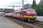 Am 18 Juni 2014 hlt NMBS 835 in Antwerpen-Noorderdokken.