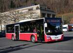 (269'896) - PostAuto Bern - BE 403'166/PID 12'33? - MAN (ex A-Wien) am 16. Dezember 2024 beim Bahnhof Interlaken Ost