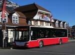 (269'900) - PostAuto Bern - BE 654'090/PID 12'33? - MAN (ex A-Wien) am 16. Dezember 2024 beim Bahnhof Interlaken Ost