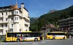 (289'445) - GrindelwaldBus, Grindelwald - Nr. 14/BE 202'568 MAN/G�ooel + Nr. 30/BE 171'240 - Mercedes am 7. Juli 2026 beim Bahnhof Grindelwald