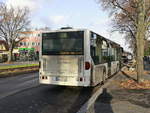 Daimler Bus der OBE Oberhavel Bus Express GmbH, Oranienburg steht an der Strecke der NEB - Die Niederbarnimer Eisenbahn in Berlin Rudow in der Stubenrauchstrae.