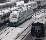 Winterbild 2: Mit Puderzucker überzogen stehen einige verschiedene Triebwagen u.a MF/MFB 50/5268 und Lint II AR 2048 A/B in der Abstellung des Aarhuser Gbf.