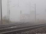 im Nebel sieht man 711 116-4 am Bahnhof Stralsund-Rgendamm Stehen am 14.11.13