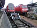 101 073-5 & S2 (Bestehend aus BR 143 + 3 Dostowagen) mit Ziel Warnemnde im Bahnhof Rostock Hbf am 13.4.13