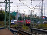 OLA VT 706 unterwegs nach Halberstadt, whrenddessen 143 XXX in den Bahnhof Halle (Saale) Hbf einfhrt am 29.8.16