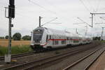 146 570 mit einem InterCity bei der Durchfahrt im Bahnhof Niemberg am 5.7.21