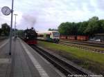 RBB 99 1781 bei der Einfahrt in den Bahnhof Putbus & PRESS 650 032-4 abgestellt am 2.6.13