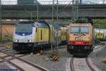 BTH/START 246 004 mit RE5 nach Cuxhaven und die abgestellte BRLL/HSL 185 597 am 08.05.2019 in Hamburg-Harburg