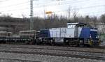 LOCON 275 818-3 fuhr mit einen bauzug durch harburg,18.03.21