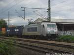 386 007 von Metrans mit einem Gterzug bei der durchfahrt in Delitzsch am 25.8.15